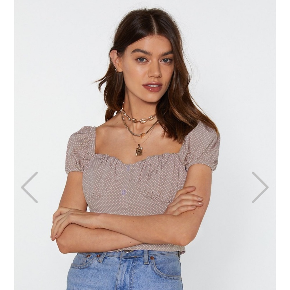 Brand new button up blouse. Never worn with tags